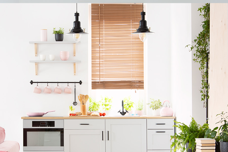 Natural wood blinds highlight your living space. Beautiful and timeless white Polywood blinds are the perfect touch for your bathroom.